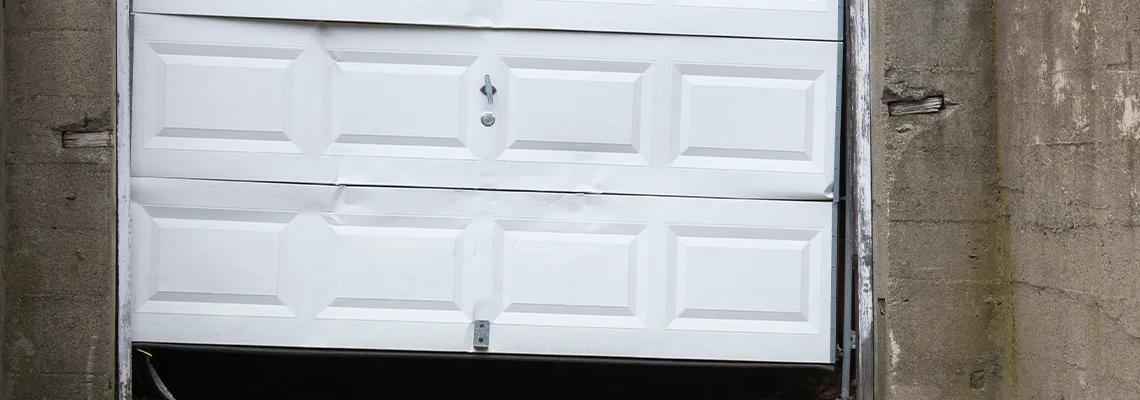 Garage Door Got Hit By A Car Dent Removal in Ellenbrook, WA